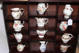 Twelve Royal Worcester Historic Jugs from The Worcester Royal Porcelain Company in stand with COA's,