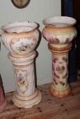 Two Edwardian floral decorated jardinieres and stands, tallest 94cm.