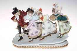 Scheibe-Alsbach porcelain group of skaters, having gallant and four maidens holding hands,