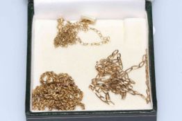 Three 9 carat gold fine necklaces, one rope twist and two chain link.