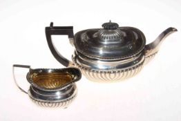 Silver part fluted teapot and cream jug, Sheffield 1915 and 1922.