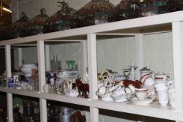 Large shelf collection including Staffordshire Dogs, Mason's soup tureen, wall tiles, ceramics,