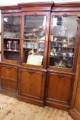 Victorian mahogany breakfront cabinet bookcase having three glazed panel doors above three cupboard