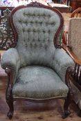 Victorian mahogany framed gents chair in green buttoned fabric.