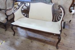 Late 19th Century mahogany framed parlour settee on cabriole legs.