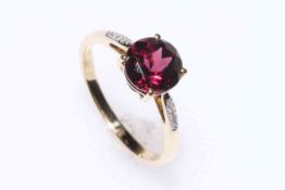 Garnet and diamond 9k gold ring, the round garnet 3.5 carats, size P/Q, with certificate.