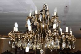 Two tier fifteen branch gilt chandelier with glass lustre drops.