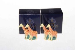 Two boxed Royal Crown Derby giraffes, 7cm high.