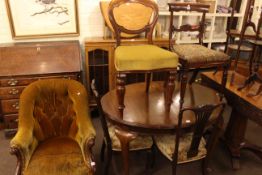 Walnut three door china cabinet on cabriole legs, early 20th Century oval mahogany dining table,