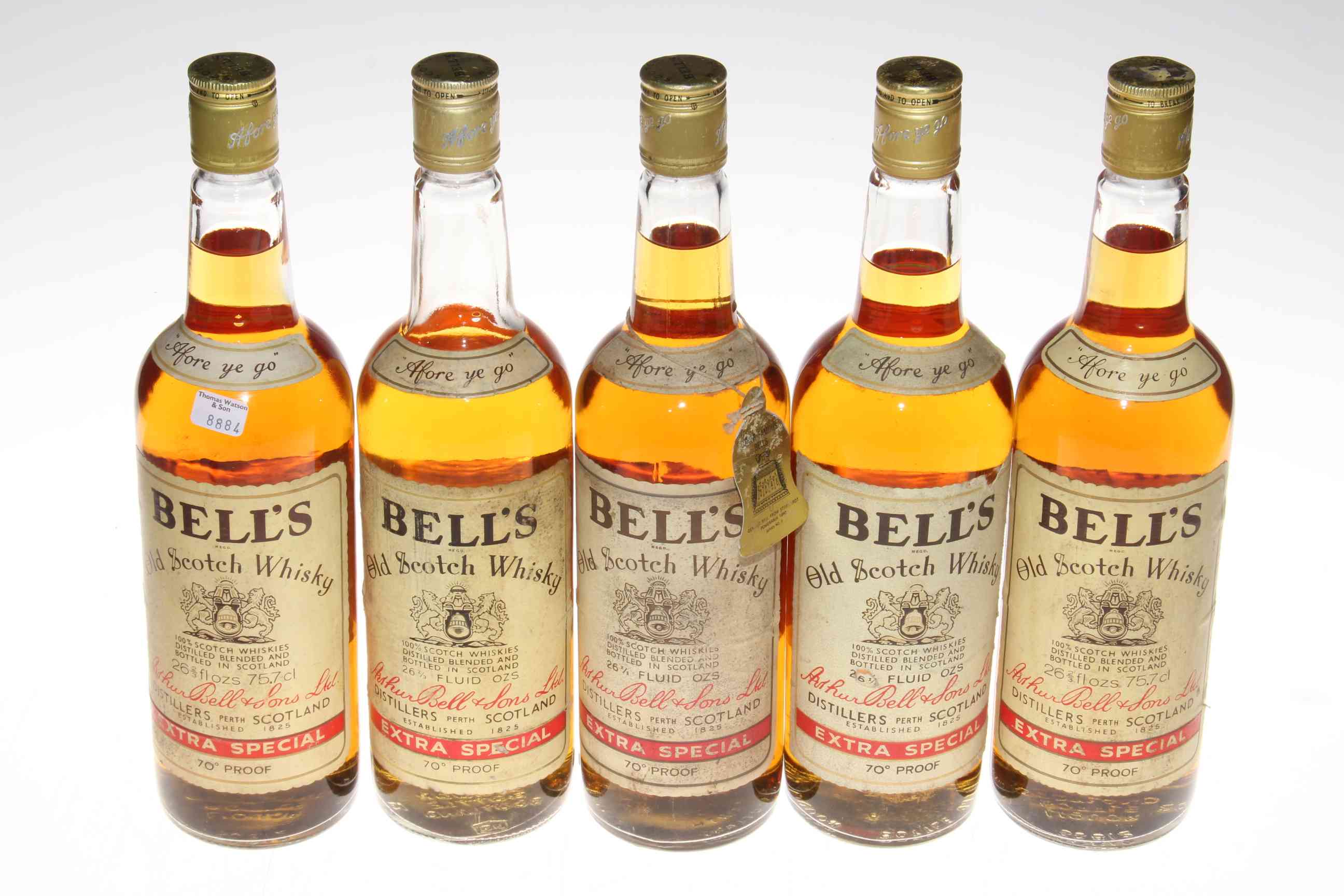 Five bottles Bell's Extra Special whisky.