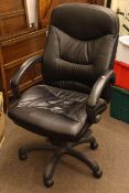 Black leather adjustable swivel office armchair.
