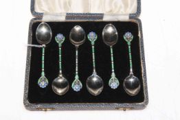 William Hutton & Sons set of six silver and enamel coffee spoons, Birmingham 1932, cased.