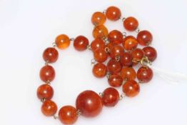 Amber bead necklace, 40cm length.