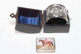 Silver jockey on horseback snuff box, 3.5cm across, and silver vine napkin ring (2).