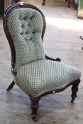 Victorian spoons back nursing chair in buttoned fabric.