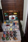 Collection of Diecast toys including Matchbox and Lledo, with two display stands.