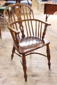 19th Century ash and elm pierced splat back Windsor elbow chair with crinoline stretcher.