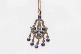 Cabachon sapphire and diamond pendant with 9 carat gold chain, 5cm drop.