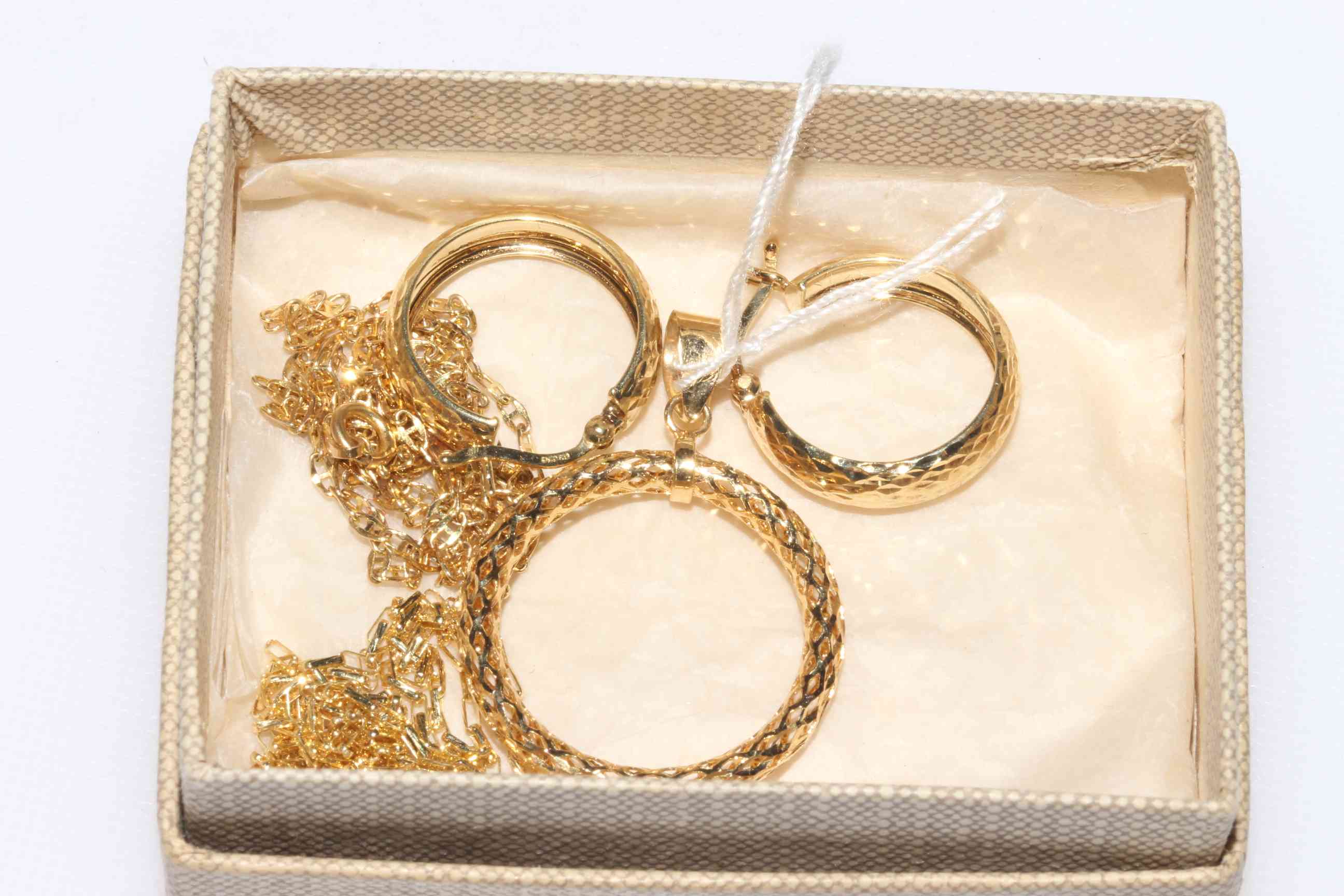 9 carat gold ring pendant, pair earrings and two fine chain necklaces.