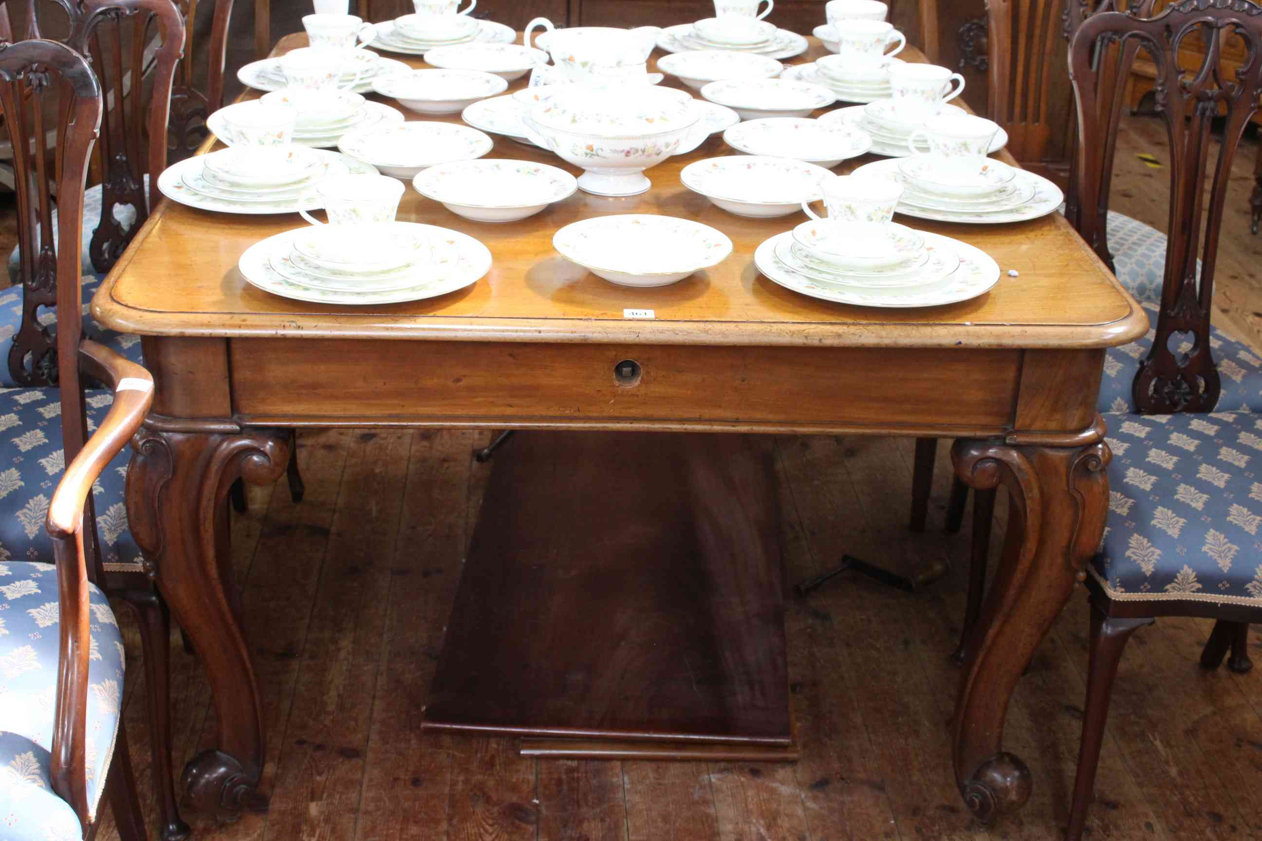 Victorian mahogany extending dining table, two leaves and two winders on carved cabriole legs, - Image 2 of 3