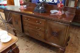 Early 20th Century mahogany sideboard on ball and claw legs, 116cm high by 168cm wide by 58cm deep.