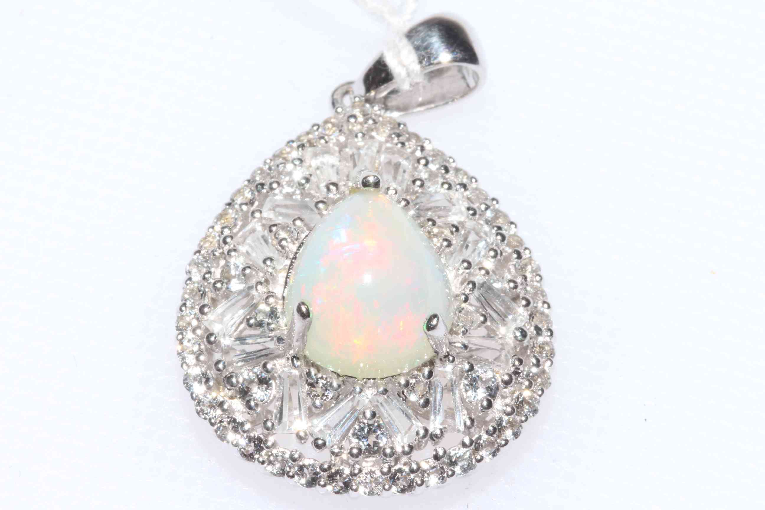 Sterling silver opal and some diamond pendant, 22mm by 18mm.