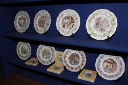 Eight Royal Doulton Brambly Hedge four seasons plates and four coasters.