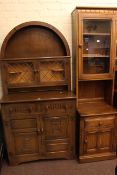 Slim Ercol glazed door cabinet, dome topped oak dresser and oak drop leaf dining table (3).