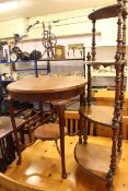 Victorian walnut four tier corner whatnot and Edwardian mahogany circular occasional table.