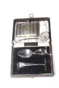 Silver purse, silver sifting spoon and cased spoon and pusher set.