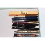 Collection of twelve vintage pens.