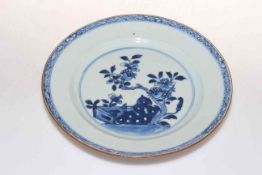 Chinese blue and white plate with floral design, 23cm.