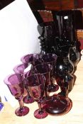 Collection of amethyst glass including decanter, goblets, etc.