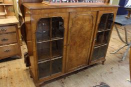 1920's/30's walnut three door cabinet bookcase, 115cm high by 141cm wide by 34cm deep.