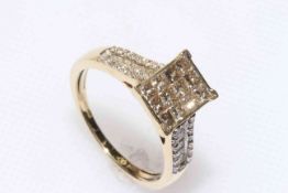 9 carat yellow gold and diamond multi stone ring, approximate diamond weight 1 carat.