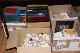 Five boxes of stamps and albums.