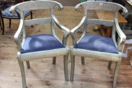 Pair white metal covered bar back elbow chairs.