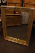 As new rectangular gilt framed wall mirror, 91cm by 72cm overall.