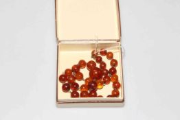 Amber bead necklace, 40cm length.
