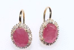 Pair 14 carat yellow gold, ruby and diamond earrings,