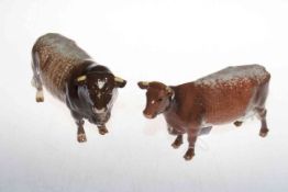 Beswick Ch. Eaton Wild Eyes and Ch. Gwersylt Lord Oxford cow figures.