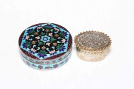 Two Eastern silver boxes, one with enamel decoration, 6.5cm diameter.