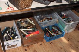 Five boxes of model railway carriages, engines, track, etc.