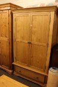 Contemporary light oak two door wardrobe and similar blanket box (2).