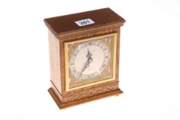 Elliott oak cased mantel clock, 17cm.