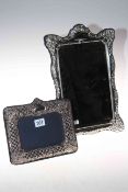 Silver framed boudoir mirror, 38cm by 24cm, and silver photograph frame (2).