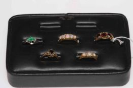 Collection of five 18 carat gold rings comprising two opal, emerald and diamond,