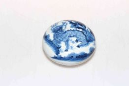 Blue and white Chinese shallow lidded dish decorated with dragon, 9.5cm diameter.