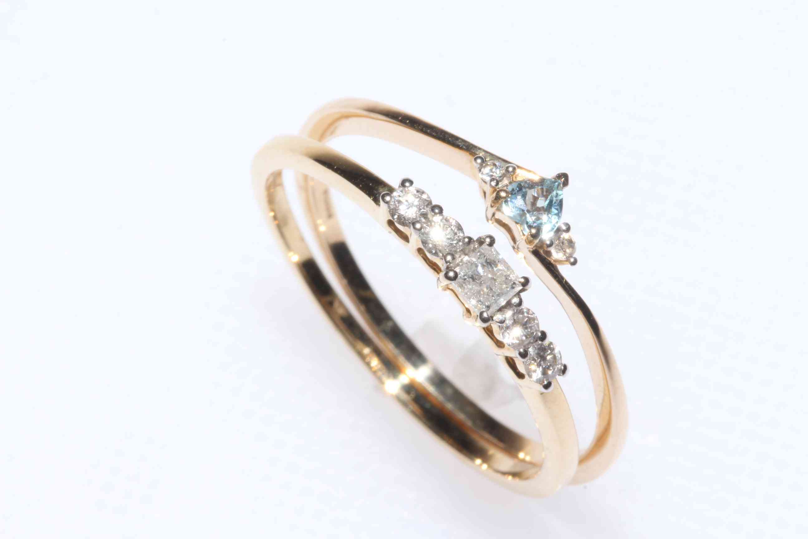 9k gold five stone diamond ring, and 9k gold aquamarine and zircon ring, sizes S,