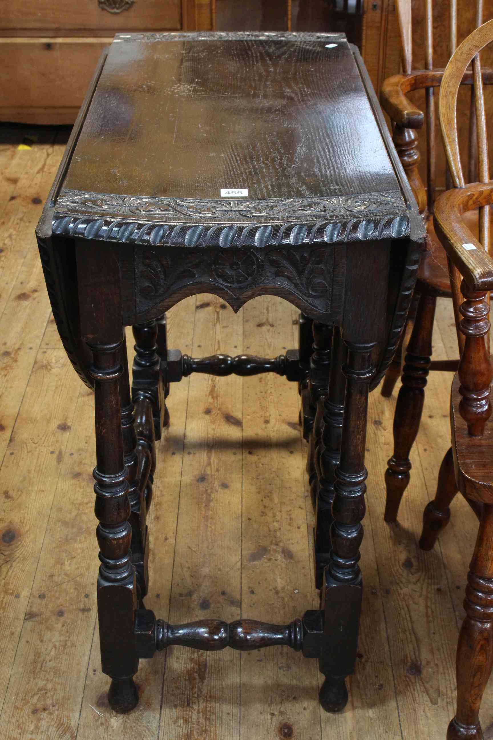 Victorian oak gate leg table with carved border, 78cm high by 91cm (leaves down).